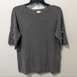 Gray top with multi-colored pearls on arms